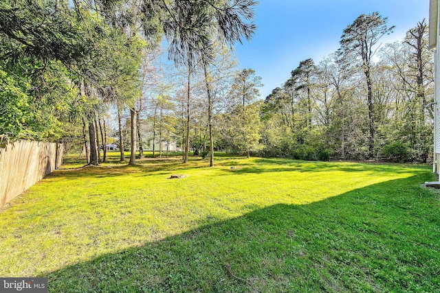 view of yard with fence