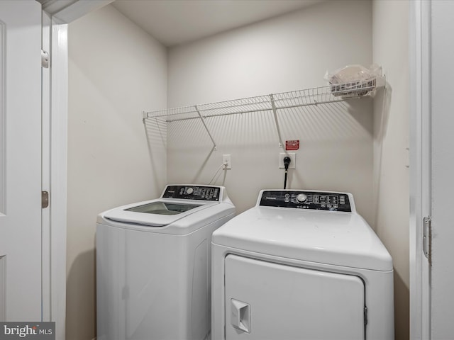 laundry room with washing machine and dryer and laundry area