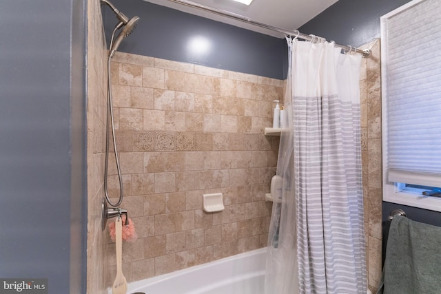 bathroom featuring shower / bathtub combination with curtain