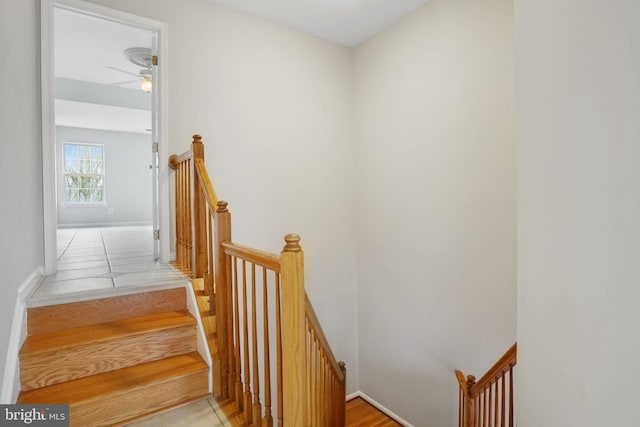 stairs featuring baseboards