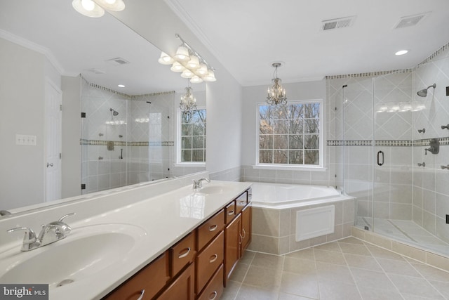 full bathroom with a garden tub, double vanity, visible vents, and a sink
