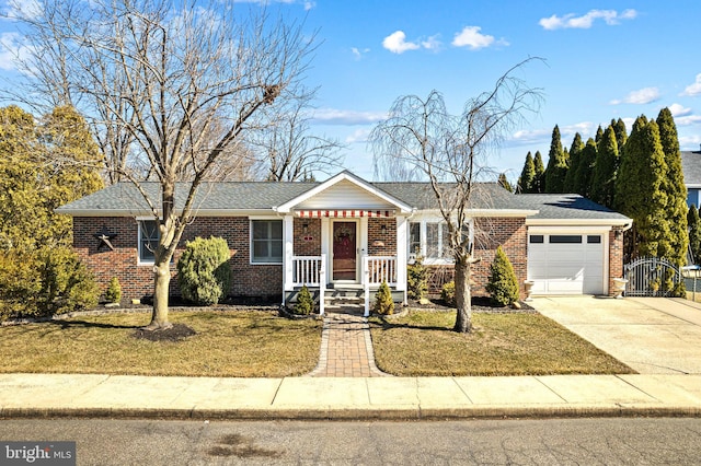 single story home with concrete driveway, brick siding, an attached garage, and a front yard