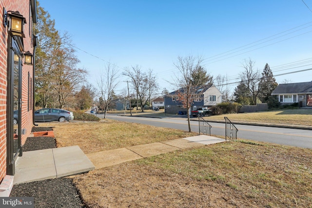 view of yard with a residential view