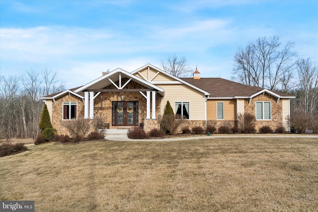 craftsman house featuring french doors, a chimney, and a front lawn