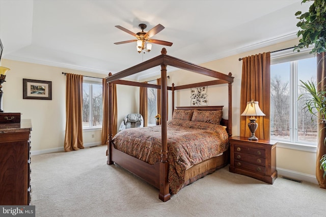 bedroom featuring carpet flooring, ceiling fan, visible vents, and baseboards