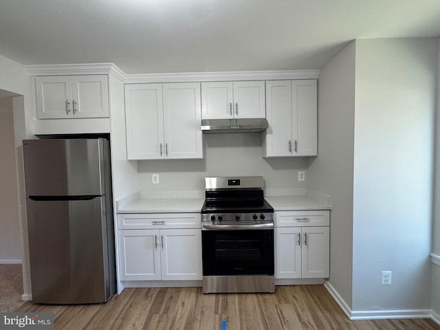 kitchen featuring white cabinets, under cabinet range hood, stainless steel appliances, and light countertops