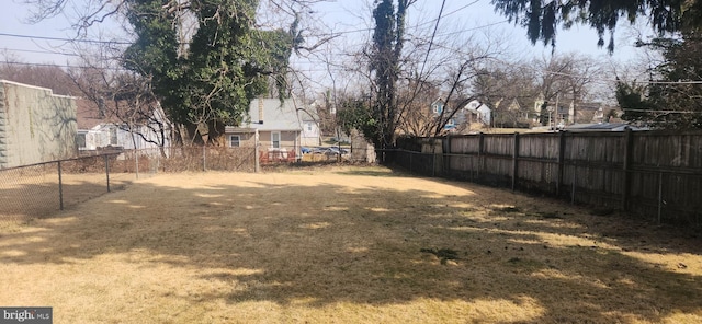 view of yard featuring a fenced backyard