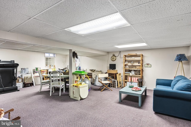 interior space with a paneled ceiling