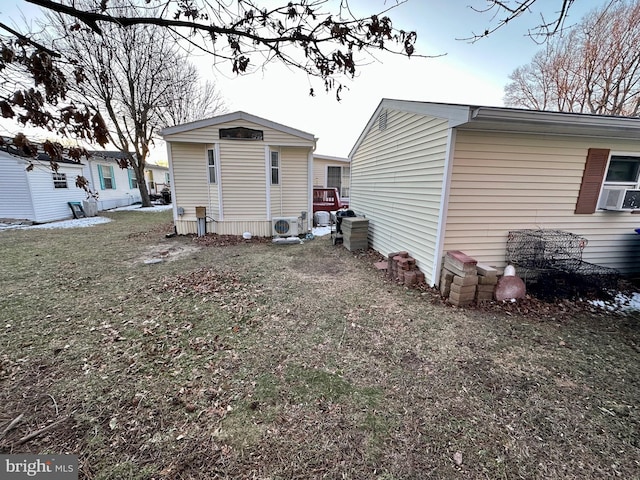 back of property featuring cooling unit