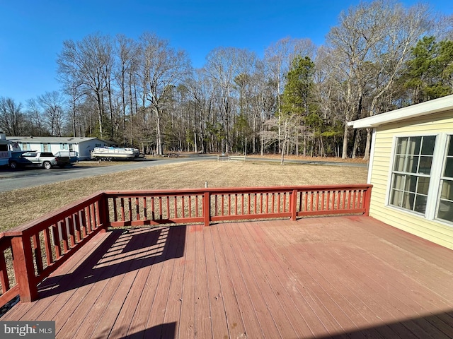 deck featuring a yard