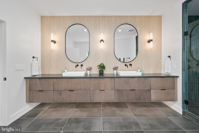 4810 3rd St N, Arlington, VA 22203 - bathroom with double vanity, a tile shower, and tile patterned flooring