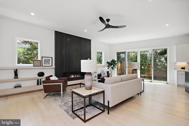 4810 3rd St N, Arlington, VA 22203 - living room with light wood-style floors, ceiling fan, recessed lighting, and a large fireplace
