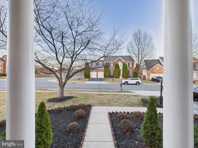 view of yard with a residential view