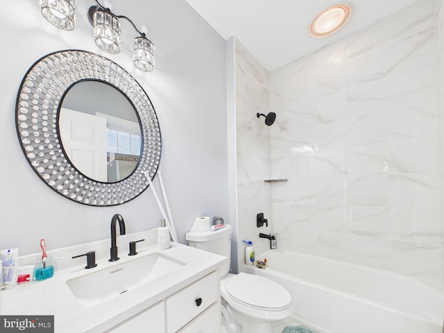 full bathroom featuring bathtub / shower combination, vanity, and toilet