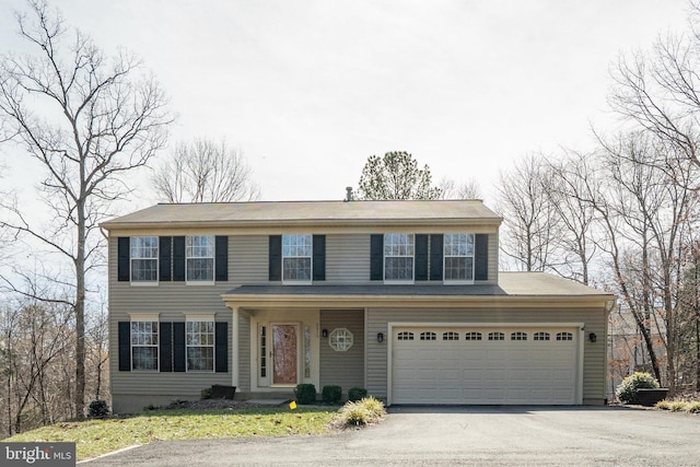 view of front of property featuring driveway