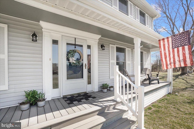 entrance to property with a porch