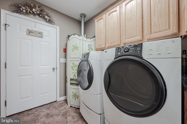 17024 Turtle Hl, Milford, DE 19963 - washroom featuring baseboards, washer and clothes dryer, cabinet space, and stone finish flooring