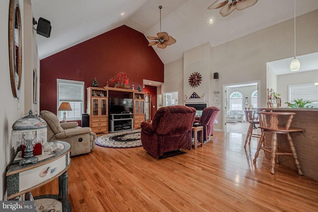 17024 Turtle Hl, Milford, DE 19963 - living area featuring high vaulted ceiling, ceiling fan, and light wood-style flooring