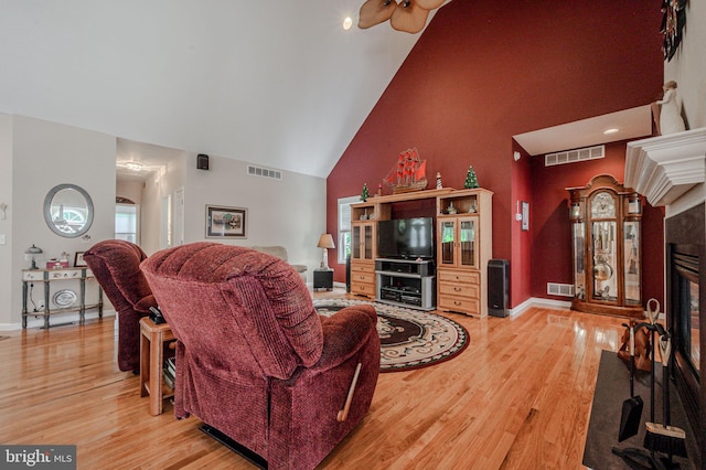 17024 Turtle Hl, Milford, DE 19963 - living area with high vaulted ceiling, visible vents, and light wood finished floors