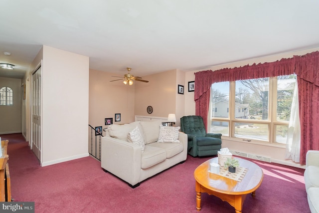 carpeted living room featuring visible vents and baseboards