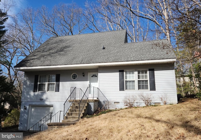 view of front of home featuring crawl space, roof with shingles, and an attached garage