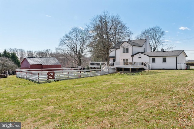 3524 Blenheim Rd, Phoenix, MD 21131 - view of yard featuring a deck, an outdoor structure, and fence