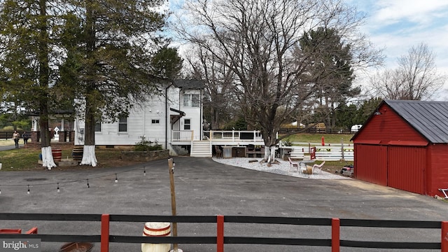 3524 Blenheim Rd, Phoenix, MD 21131 - exterior space featuring an outbuilding, a deck, and fence