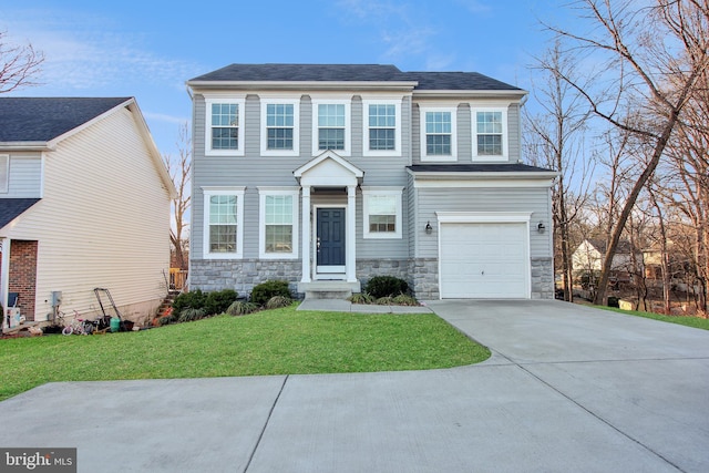 view of front of property with a garage, stone siding, concrete driveway, and a front yard