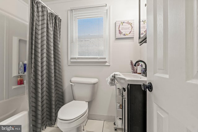 full bathroom with tile patterned flooring, toilet, vanity, baseboards, and shower / bathtub combination with curtain