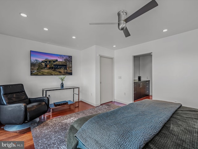 bedroom featuring recessed lighting, ceiling fan, baseboards, and wood finished floors