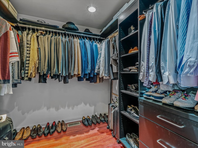 walk in closet with visible vents