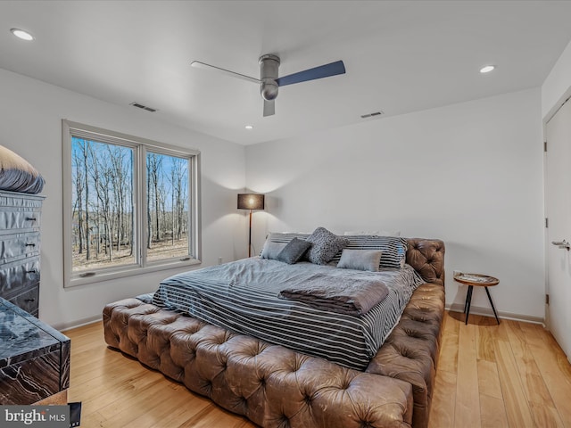 bedroom with recessed lighting, visible vents, and hardwood / wood-style flooring