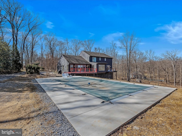 pool with a wooden deck