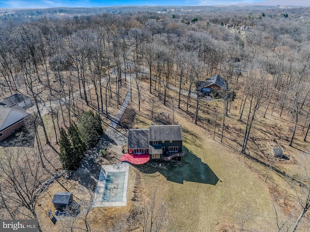 bird's eye view with a rural view and a view of trees