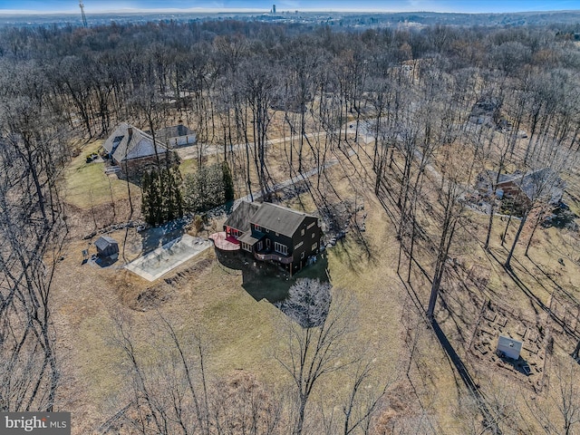 drone / aerial view with a view of trees