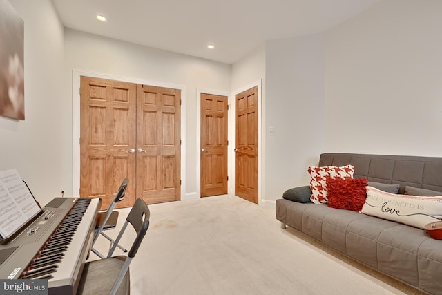 carpeted office featuring baseboards and recessed lighting