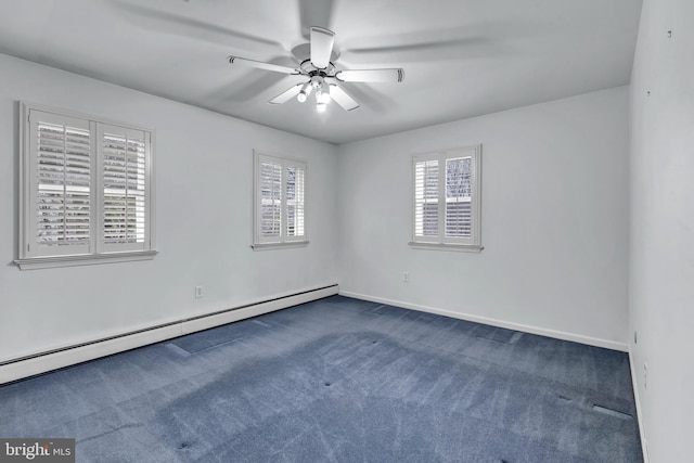 empty room with baseboard heating, dark carpet, baseboards, and a ceiling fan