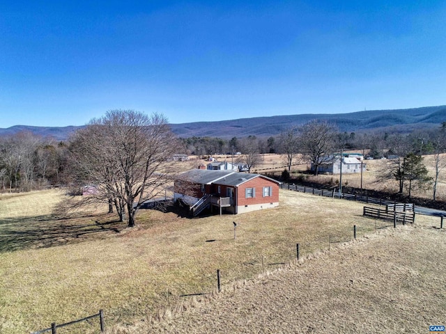 view of mountain feature featuring a rural view