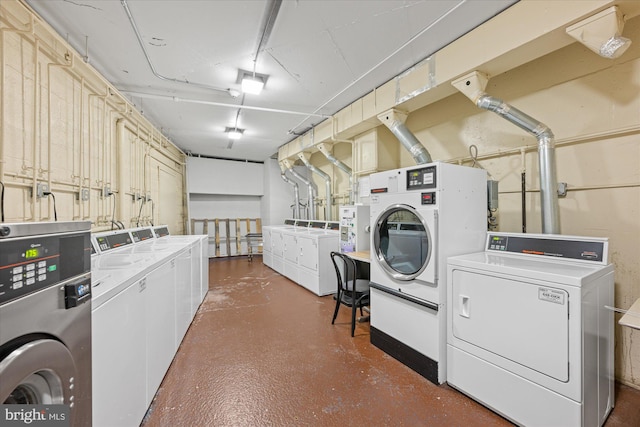 common laundry area with washing machine and clothes dryer