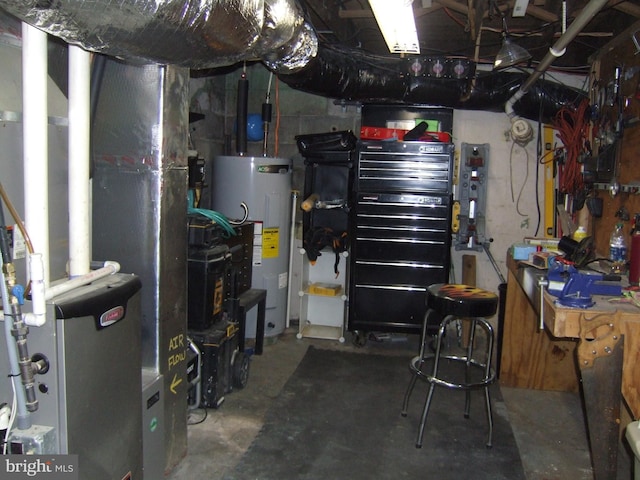 utility room featuring electric water heater