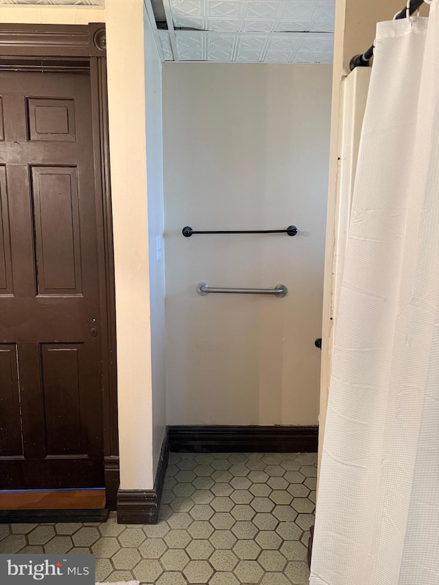 bathroom featuring baseboards