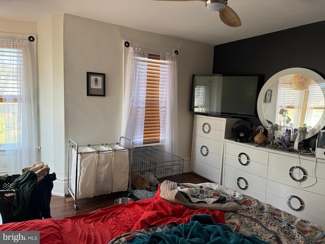 bedroom with wood finished floors