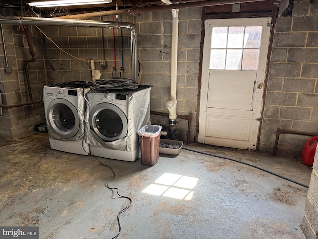 laundry area with laundry area and washing machine and dryer