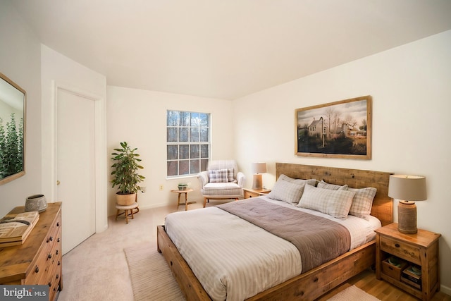 bedroom with light carpet