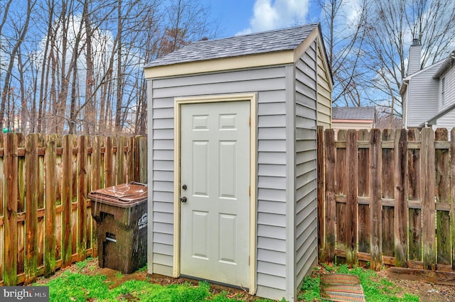 view of shed featuring a fenced backyard