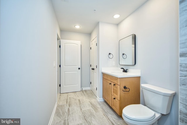 103 Matte Ln, Havre De Grace, MD 21078 - bathroom featuring vanity, toilet, baseboards, and recessed lighting