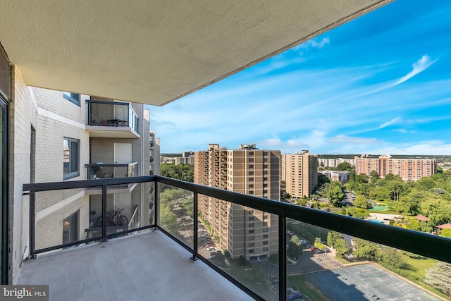 balcony featuring a view of city