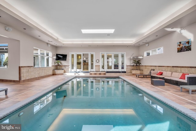 pool featuring a skylight