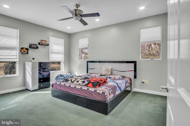 bedroom featuring carpet floors, recessed lighting, visible vents, and baseboards