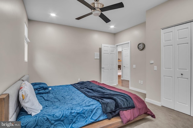 bedroom featuring ceiling fan, recessed lighting, carpet floors, baseboards, and a closet